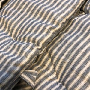 Pottery Barn Kids crib bumper is chambray/grey/white